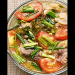 Canh bò nấu cải chua